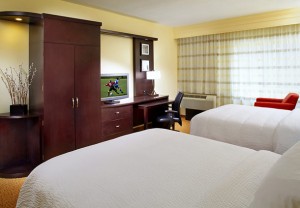 Hotel Room with Double Beds and TV